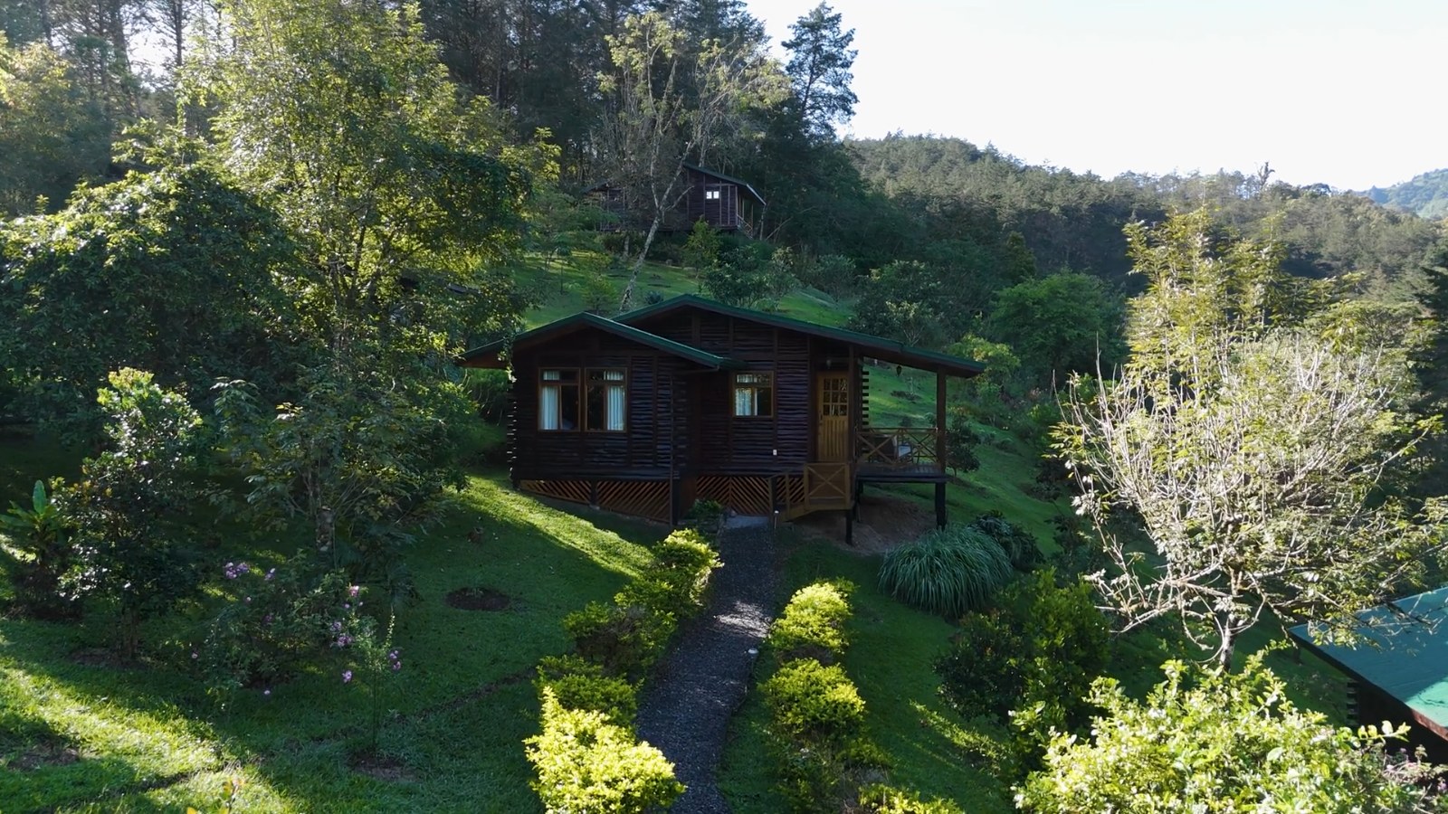 Inside a cabin at Verdesana, looking through to the deck