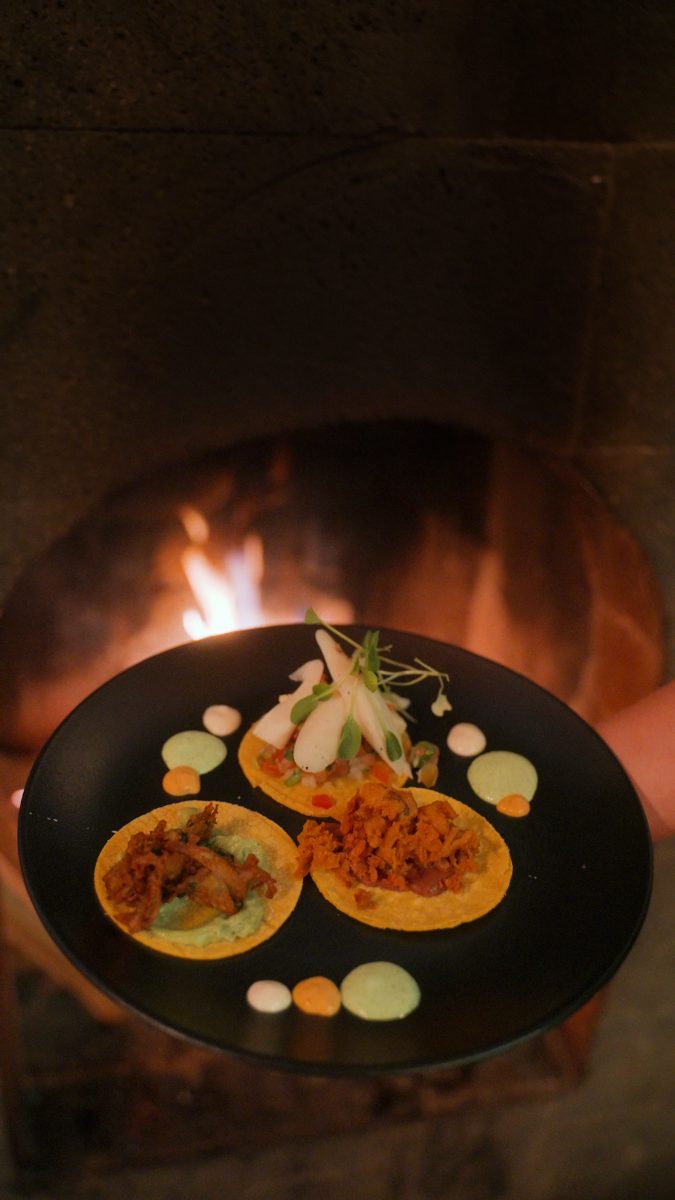 A plated dinner beside the fire
